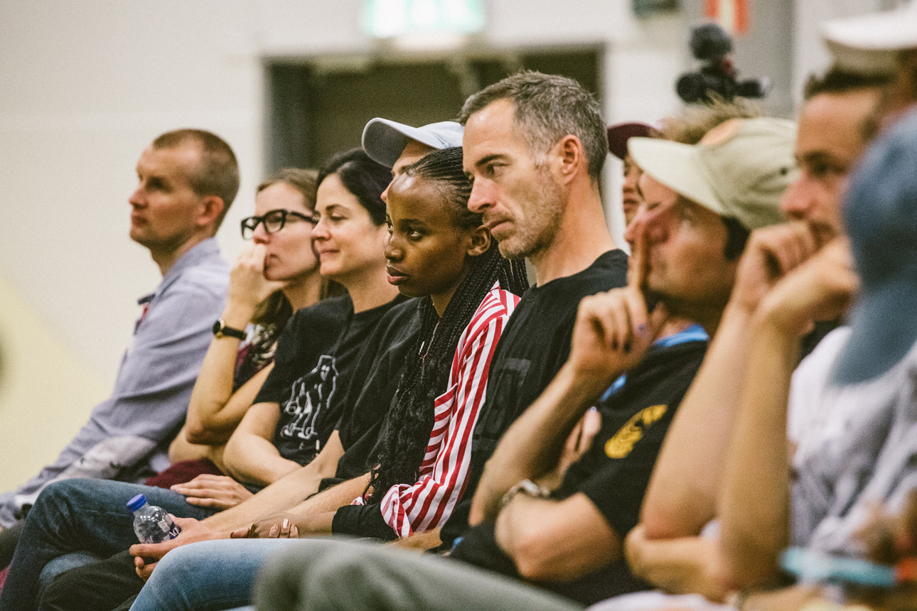 The crowd listens to important topics around mental health and skateboarding at Pushing Boarders