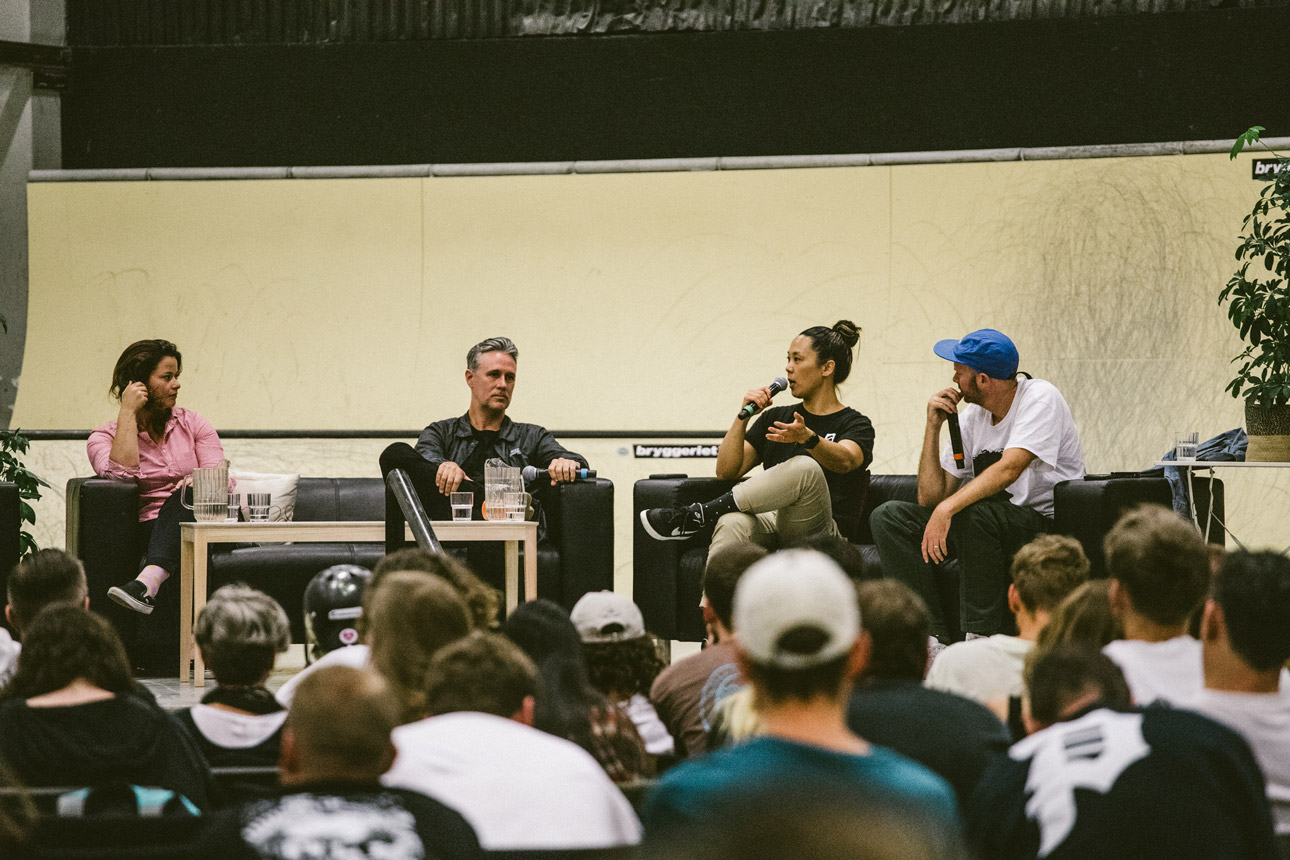 Kim Woozy speaking on the Stay Core Stay Poor panel at Pushing Boarders