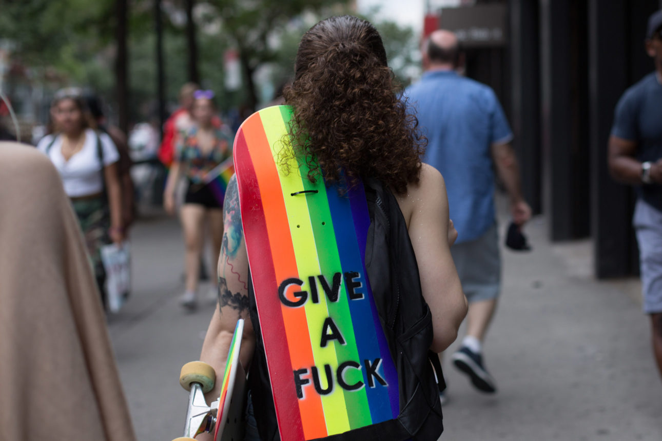 Mariah Davenport in the streets of New York with the Skate Brooklyn x SPCC Project deck.